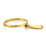Złoty pierścionek 585 wisząca stópka 1,17 g