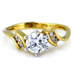 Złoty pierścionek 585 zaręczynowy z biała cyrkonią