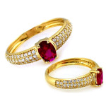 Złoty pierścionek 585 z czerownym kamieniem w kolorze rubinu i cyrkoniami