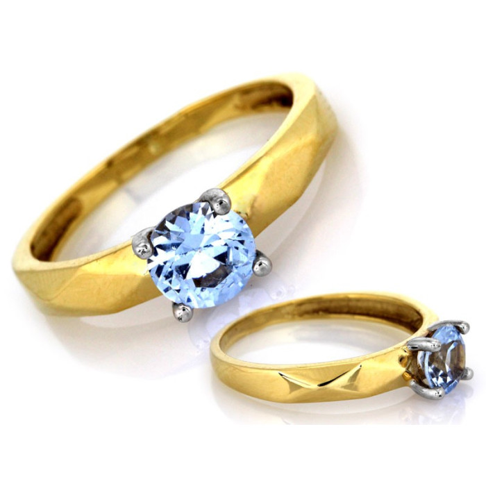 Delikatny pierścionek złoty 375 z błękitnym oczkiem na zaręczyny