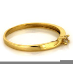 Złoty pierścionek 375 z jedną subtelną cyrkonią