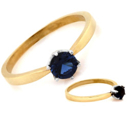 Złoty pierścionek z topazem London Blue