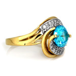 Duży pierścionek ze złota 585 z niebieską cyrkonią i białym złotem
