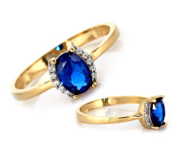 Złoty pierścionek z niebieskim oczkiem w pięknej oprawie