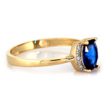 Złoty pierścionek 375 z niebieskim oczkiem w oprawie cyrkonii