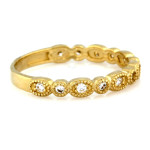 Złoty pierścionek 585 subtelny z drobnymi cyrkoniami obrączkowy