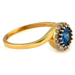 Złoty pierścionek 333 markiza z niebieskim akwamarynem i cyrkoniami