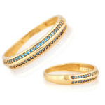 Złoty pierścionek 585 obrączkowy z niebieskimi cyrkoniami