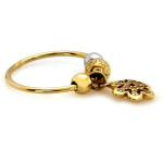 Złoty pierścionek 585 z kulkami i wiszącym kwiatkiem