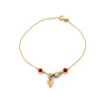 Złota bransoletka 585 z wiszącym aniołem i czerwonymi kamieniami na prezent