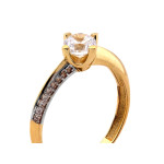 Złoty pierścionek 585 z oczkiem i cyrkoniami z boku szyny