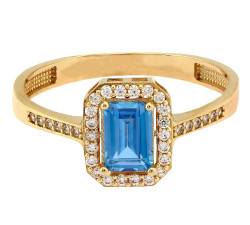 złoty pierścionek z niebieskim topazem