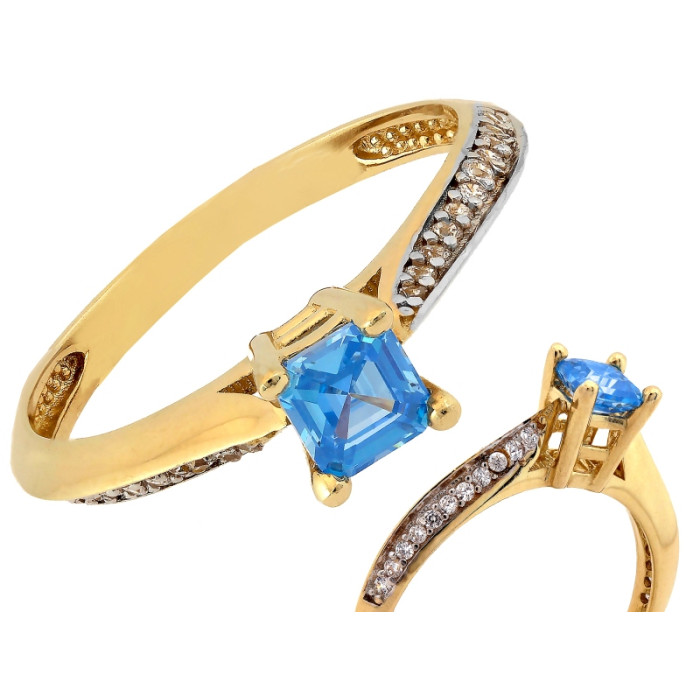 Złoty pierścionek 585 z niebieskim oczkiem z cyrkoniami na szynie
