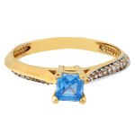 Złoty pierścionek 585 z niebieskim oczkiem z cyrkoniami na szynie