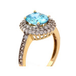 Złoty pierścionek 585 markiza z niebieskim topazem syntetycznym i cyrkoniami