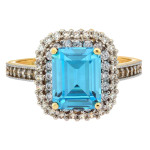 Złoty pierścionek 585 z niebieskim topazem syntetycznym markiza
