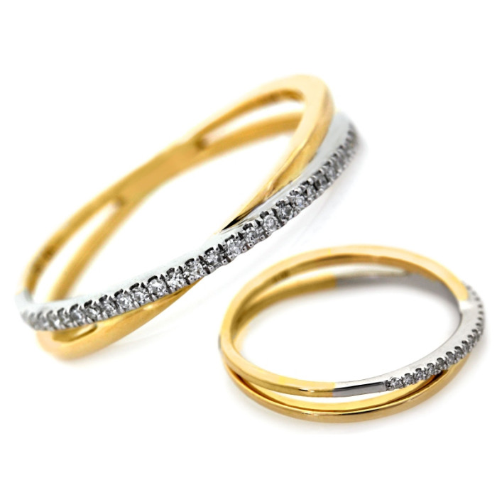 Złoty pierścionek przeplatany z brylantami