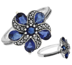 Duży srebrny pierścionek kwiatek z niebieskimi cyrkoniami i markazytami 