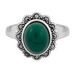 Srebrny pierścień owalny oksydowany z ciemnym zielonym kamieniem 