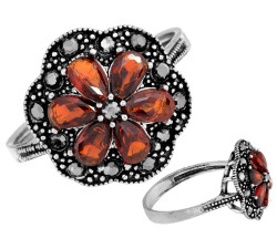 Duży srebrny pierścień okrągły kwiat z czerwonych cyrkonii