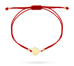 Bransoletka złote serce w poprzek z cyrkonią na czerwonym sznurku