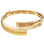 Złota bransoletka 585 elegancka bangle sztywna z cyrkoniami