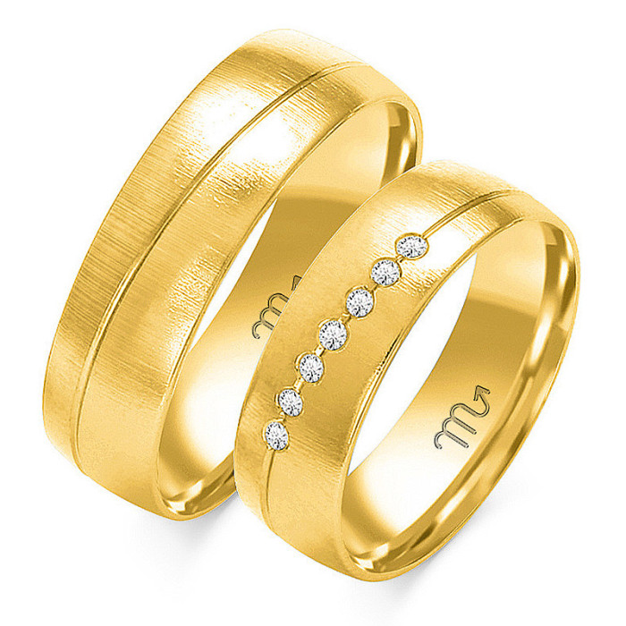 Ślubna obrączka z diamentami grawerowana złota 333