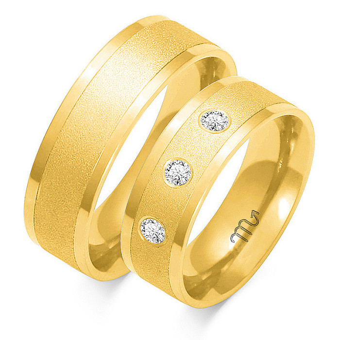 Ślubna obrączka z diamentami grawerowana złota 585
