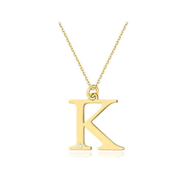 Złoty naszyjnik 585 litera K z diamentem 1,4g