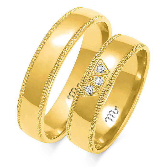 Obrączka ze wzorem z diamentami ślubna grawerowana złota 585