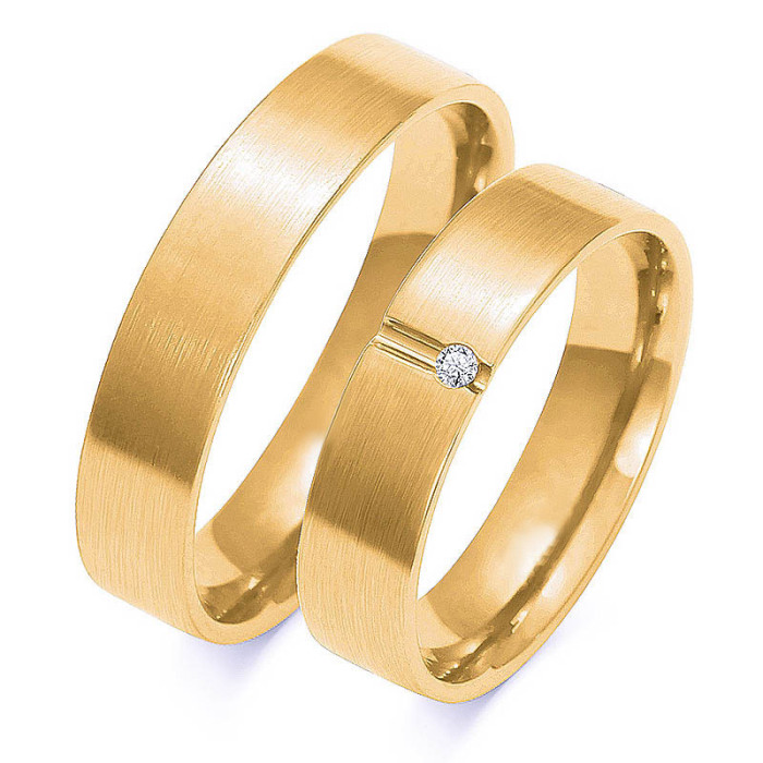 Obrączka ślubna złota 585 nowoczesna z diamencikiem