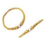 Złota bransoletka 585 z błyszczących kulek i perłą 7,9g